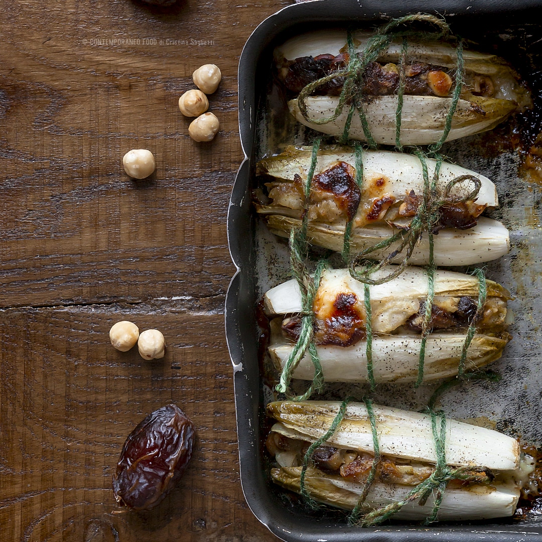 Immagine: Insalata belga al forno farcita con fontina, datteri e nocciole